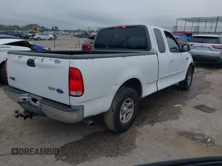 2001 Ford F-150 XL z VIN 1FTZX17281NB02781, wystawiony jako IAAI lot #42377688 z przebiegiem 180 830 mil mil oraz . Historia ofert i sprzedaży dostępna na DreamBid. Obrazek 4.