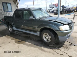 2002 Ford Explorer Sport Trac Value with VIN 1FMZU67E72UC81009, listed as a Copart auction lot 54929835 with 130,862 mi miles and Salvage title. Bid and sale history available at DreamBid. Image 4.