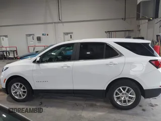 2022 Chevrolet Equinox LT z VIN 2GNAXKEV8N6118013, wystawiony jako IAAI lot #42306755 z przebiegiem 76 669 mil mil oraz . Historia ofert i sprzedaży dostępna na DreamBid. Obrazek 14.