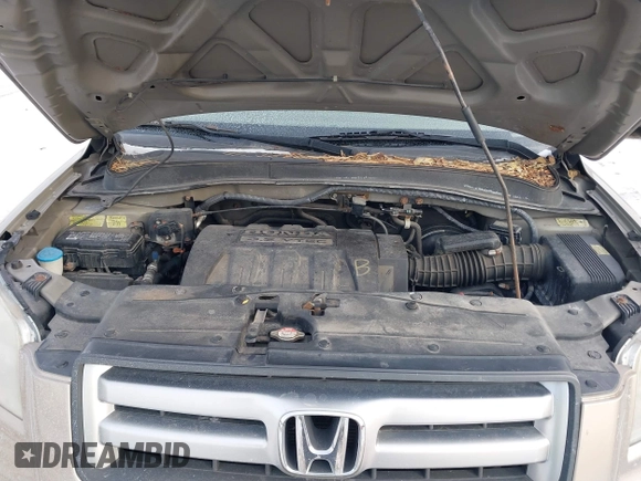 2006 Honda Pilot EX-L with VIN 2HKYF18526H546575, listed as a IAAI auction lot 41414263 with 118,872 mi miles and . Bid and sale history available at DreamBid. Image 10.