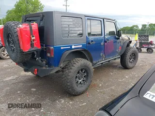 2007 Jeep Wrangler Unlimited X with VIN 1J4GA39167L138041, listed as a IAAI auction lot 42113260 with Not provided miles and . Bid and sale history available at DreamBid. Image 4.