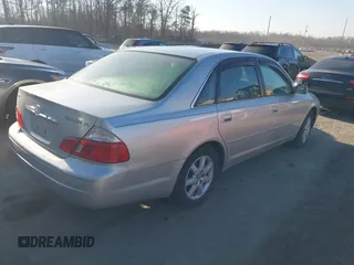 2003 Toyota Avalon XL with VIN 4T1BF28B13U307386, listed as a IAAI auction lot 41652379 with 149,730 mi miles and . Bid and sale history available at carsss.com. Image 4.