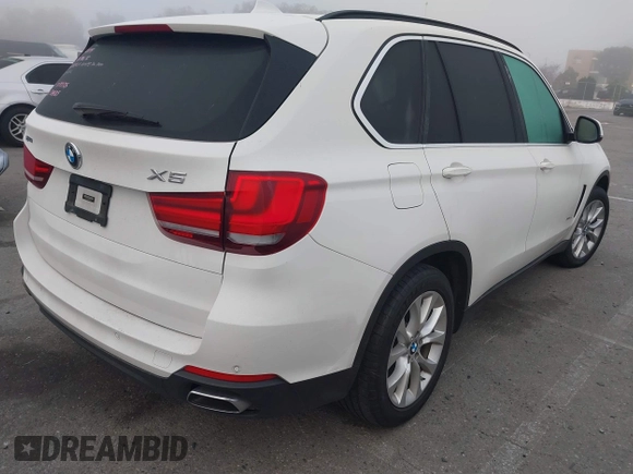 2016 BMW X5 xDrive40e with VIN 5UXKT0C59G0S79593, listed as a IAAI auction lot 41846666 with 57,178 mi miles and . Bid and sale history available at DreamBid. Image 4.