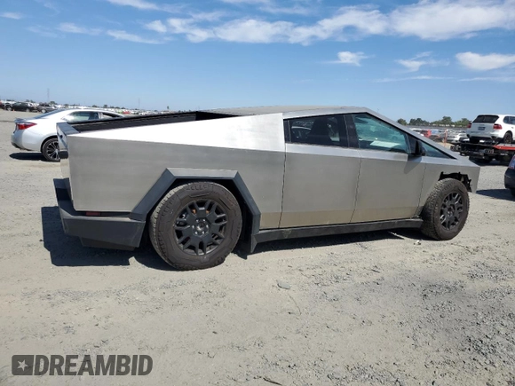 2024 Tesla Cybertruck с VIN 7G2CEHEDXRA010522, выставлен на аукционе Copart как лот 60874185 с пробегом Не указан миль и Списание • Salvage title. История ставок и продаж доступна на DreamBid. Изображение 3.