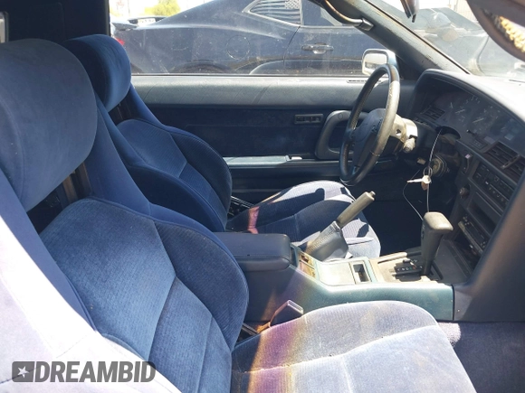 1989 Toyota Supra z VIN JT2MA71J7K0107654, wystawiony jako IAAI lot #42078617 z przebiegiem 181 176 mil mil oraz . Historia ofert i sprzedaży dostępna na DreamBid. Obrazek 5.