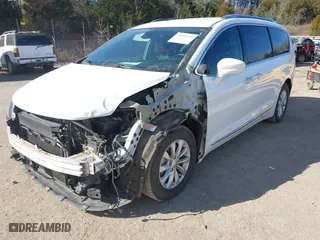2018 Chrysler Pacifica Touring L Plus with VIN 2C4RC1EG3JR315828, listed as a IAAI auction lot 41651636 with 133,009 mi miles. Bid and sale history available at carsss.com. Image 18.