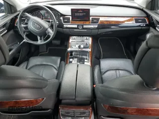 2014 Audi A8 3.0T z VIN WAURGAFD5EN007035, wystawiony jako Copart lot #58578545 z przebiegiem 199 696 mil mil oraz Tytuł czysty. Historia ofert i sprzedaży dostępna na DreamBid. Obrazek 8.