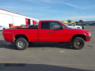 1999 Dodge Dakota SLT with VIN 1B7GG22XXXS290116, listed as a IAAI auction lot 41372636 with 132,112 mi miles and . Bid and sale history available at carsss.com. Image 13.