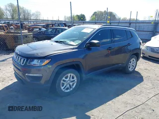 2019 Jeep Compass Sport with VIN 3C4NJCAB0KT613116, listed as a IAAI auction lot 39002435 with 59,805 mi miles and . Bid and sale history available at DreamBid. Image 17.