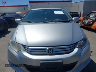 2010 Honda Insight EX with VIN JHMZE2H74AS041533, listed as a IAAI auction lot 42675766 with 203,357 mi miles and . Bid and sale history available at DreamBid. Image 12.