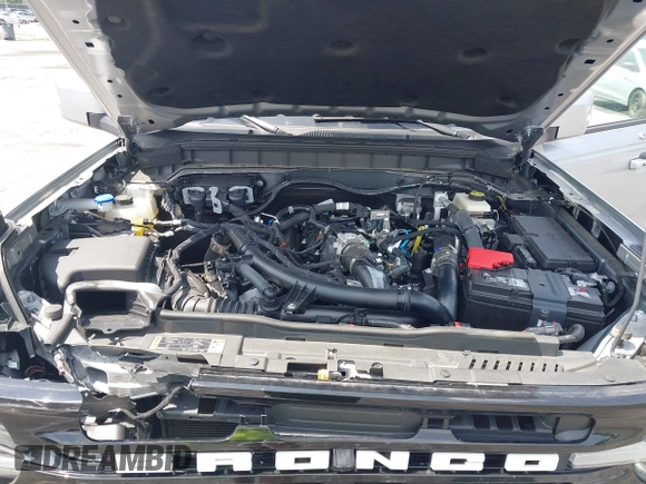 2023 Ford Bronco z VIN 1FMEE5DPXPLB06603, wystawiony jako IAAI lot #42183408 z przebiegiem 22 272 mil mil oraz . Historia ofert i sprzedaży dostępna na DreamBid. Obrazek 10.