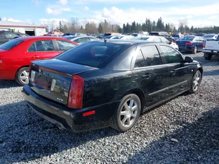 2005 Cadillac STS with VIN 1G6DW677250190268, listed as a IAAI auction lot 41702798 with 142,427 mi miles. Bid and sale history available at carsss.com. Image 4.