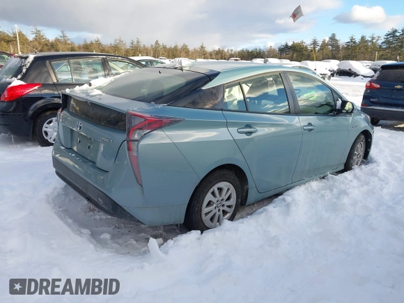2016 Toyota Prius Two with VIN JTDKBRFU4G3017233, listed as a IAAI auction lot 41520005 with 95,501 mi miles and . Bid and sale history available at DreamBid. Image 4.