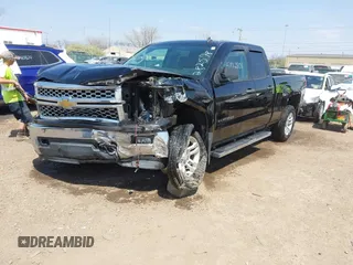 2014 Chevrolet Silverado 1500 LT with VIN 1GCVKREH9EZ282578, listed as a IAAI auction lot 42062801 with 163,158 mi miles and . Bid and sale history available at DreamBid. Image 2.