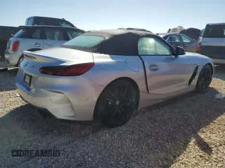 2022 BMW Z4 sDrive30i with VIN WBAHF3C03NWX80169, listed as a Copart auction lot 74791084 with 0 mi miles and Salvage Title. Bid and sale history available at carsss.com. Image 3.