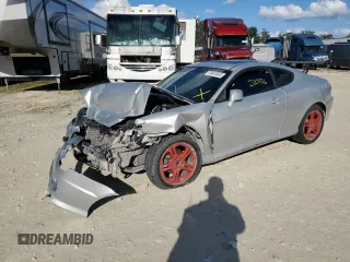 2006 Hyundai Tiburon GT z VIN KMHHN65F96U224661, wystawiony jako Copart lot #76643653 z przebiegiem 200 436 mil mil oraz Szkody całkowita. Historia ofert i sprzedaży dostępna na DreamBid. Obrazek 1.