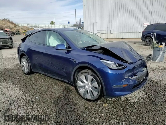 2024 Tesla Model Y Long Range с VIN 7SAYGDEE5RF983771, выставлен на аукционе Copart как лот 86153274 с пробегом 4 105 миль миль и Списание • Salvage title. История ставок и продаж доступна на DreamBid. Изображение 14.