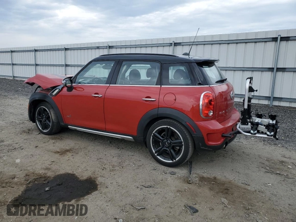 2016 MINI Countryman S with VIN WMWZC5C51GWU01015, listed as a Copart auction lot 51223155 with 74,602 mi miles and Salvage Title. Bid and sale history available at DreamBid. Image 2.