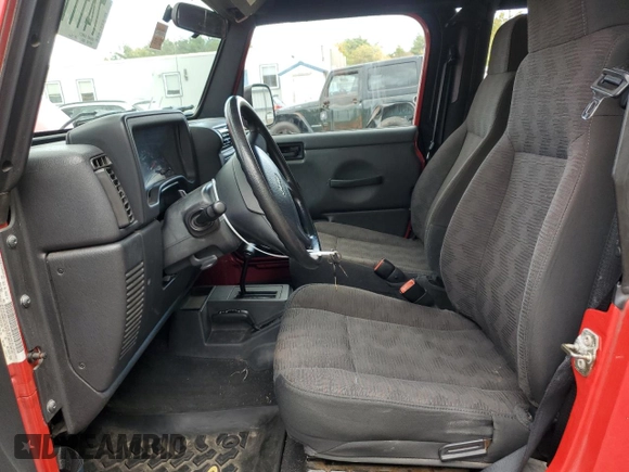 2005 Jeep Wrangler SE with VIN 1J4FA29SX5P313041, listed as a Copart auction lot 74111234 with 154,019 mi miles and Clean Title. Bid and sale history available at carsss.com. Image 7.