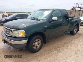 2001 Ford F-150 XL with VIN 1FTZX07271KB88709, listed as a IAAI auction lot 42599181 with 153,985 mi miles and . Bid and sale history available at DreamBid. Image 19.