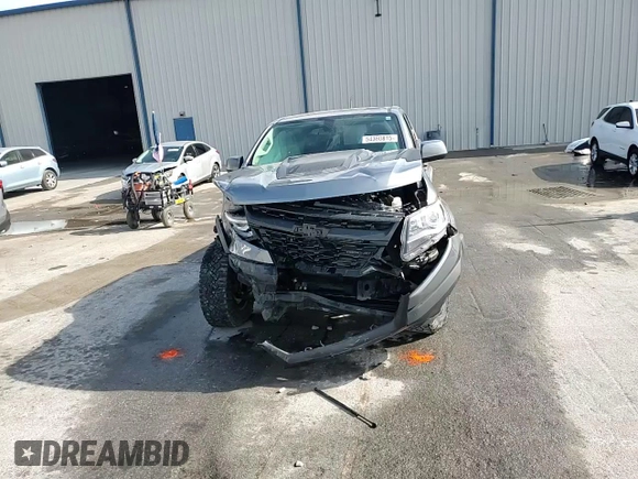 2018 Chevrolet Colorado 4WD ZR2 z VIN 1GCGTEEN2J1292947, wystawiony jako Copart lot #54360815 z przebiegiem 34 053 mil mil oraz Szkoda całkowita • Salvage title. Historia ofert i sprzedaży dostępna na DreamBid. Obrazek 13.