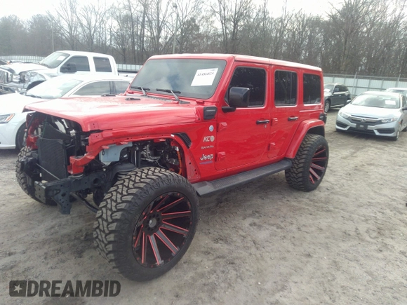 2022 Jeep Wrangler Unlimited Sahara with VIN 1C4JJXP62NW136932, listed as a IAAI auction lot 41486025 with 36,986 mi miles and . Bid and sale history available at DreamBid. Image 2.