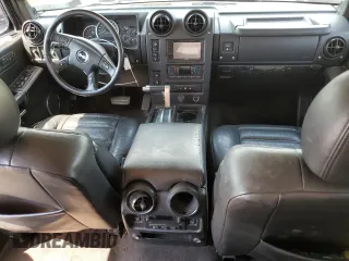 2006 Hummer H2 with VIN 5GRGN23U26H100264, listed as a Copart auction lot 58083494 with 169,104 mi miles and Salvage Title. Bid and sale history available at carsss.com. Image 8.