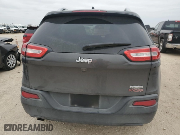 2015 Jeep Cherokee Latitude with VIN 1C4PJLCB1FW643005, listed as a Copart auction lot 46163045 with 134,840 mi miles and Salvage Title. Bid and sale history available at DreamBid. Image 6.