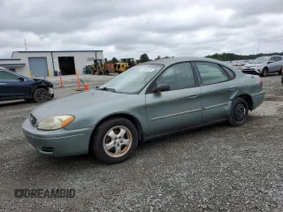 2006 Ford Taurus SE z VIN 1FAFP53U16A142612, wystawiony jako Copart lot #59805145 z przebiegiem 116 999 mil mil oraz Czysty tytuł • Clean title. Historia ofert i sprzedaży dostępna na DreamBid. Obrazek 1.