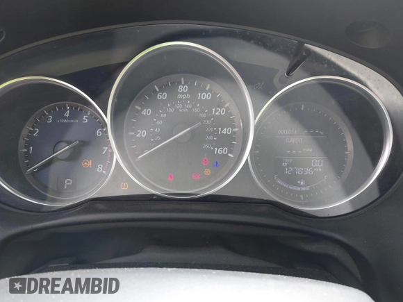2014 Mazda CX-5 Sport with VIN JM3KE2BEXE0329303, listed as a IAAI auction lot 42556908 with 127,836 mi miles and . Bid and sale history available at DreamBid. Image 7.