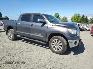 2012 Toyota Tundra 4WD Truck LTD with VIN 5TFHY5F15CX256557, listed as a Copart auction lot 58452704 with 128,640 mi miles and Salvage Title. Bid and sale history available at carsss.com. Image 4.