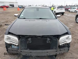 2016 Chrysler 300 with VIN 2C3CCAEG0GH348651, listed as a IAAI auction lot 41967981 with 141,728 mi miles. Bid and sale history available at carsss.com. Image 6.