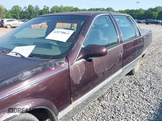 1996 Cadillac Fleetwood z VIN 1G6DW52PXTR713787, wystawiony jako IAAI lot #42079864 z przebiegiem Nie podano mil oraz . Historia ofert i sprzedaży dostępna na DreamBid. Obrazek 12.