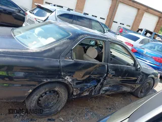 2000 Toyota Camry CE z VIN 4T1BG22K1YU663544, wystawiony jako IAAI lot #42252413 z przebiegiem 338 875 mil mil oraz . Historia ofert i sprzedaży dostępna na DreamBid. Obrazek 14.