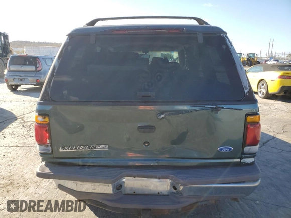 1997 Ford Explorer XL with VIN 1FMDU34E2VZC03015, listed as a Copart auction lot 80654764 with 295,587 mi miles and Salvage title. Bid and sale history available at DreamBid. Image 6.