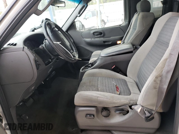 2002 Ford F-150 XL with VIN 1FTRX18L42NB60380, listed as a Copart auction lot 51806955 with 293,591 mi miles and Salvage title. Bid and sale history available at DreamBid. Image 7.