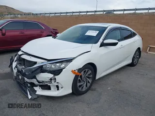 2016 Honda Civic Sedan EX with VIN 2HGFC2F70GH530459, listed as a IAAI auction lot 41710538 with 136,470 mi miles. Bid and sale history available at carsss.com. Image 2.