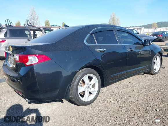 2009 Acura TSX with VIN JH4CU26659C021235, listed as a IAAI auction lot 42014591 with 201,036 mi miles. Bid and sale history available at carsss.com. Image 4.