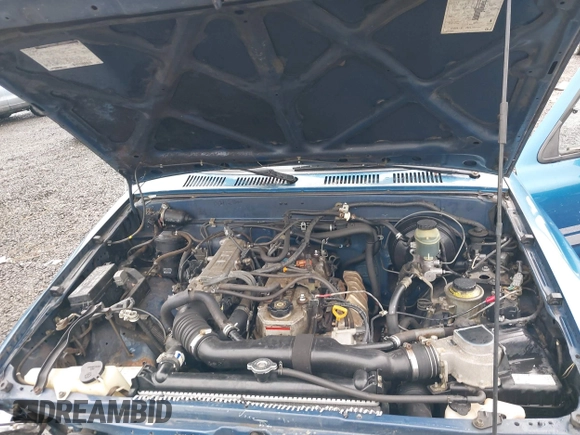 1994 Toyota Pickup z VIN 4TARN93P7RZ250278, wystawiony jako IAAI lot #41487303 z przebiegiem 119 875 mil mil oraz . Historia ofert i sprzedaży dostępna na DreamBid. Obrazek 10.