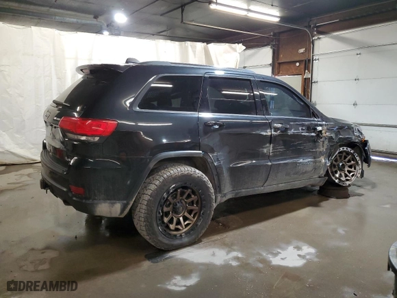 2014 Jeep Grand Cherokee Limited with VIN 1C4RJFBMXEC376797, listed as a Copart auction lot 50589305 with 164,652 mi miles and Salvage Title. Bid and sale history available at carsss.com. Image 3.