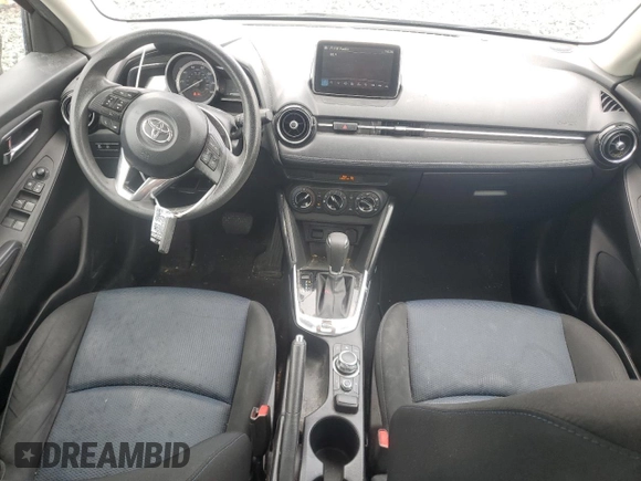 2018 Toyota Yaris with VIN 3MYDLBYV2JY329621, listed as a Copart auction lot 52351815 with 127,195 mi miles and Salvage Title. Bid and sale history available at DreamBid. Image 8.