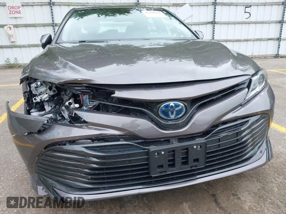 2019 Toyota Camry Hybrid LE z VIN 4T1B31HK4KU511360, wystawiony jako IAAI lot #42298260 z przebiegiem 133 019 mil mil oraz . Historia ofert i sprzedaży dostępna na DreamBid. Obrazek 17.