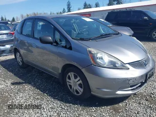 2010 Honda Fit with VIN JHMGE8H20AC010062, listed as a IAAI auction lot 41964011 with 104,651 mi miles. Bid and sale history available at carsss.com. Image 1.