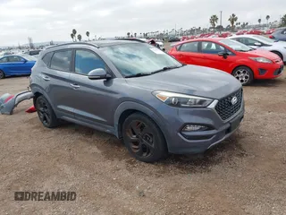 2016 Hyundai Tucson Eco with VIN KM8J3CA28GU217033, listed as a IAAI auction lot 41476238 with 76,311 mi miles. Bid and sale history available at carsss.com. Image 1.