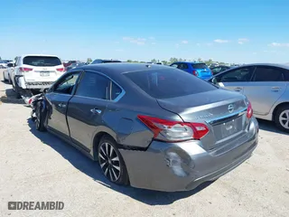 2018 Nissan Altima 2.5 SV with VIN 1N4AL3AP1JC102695, listed as a IAAI auction lot 40440992 with 58,063 mi miles. Bid and sale history available at carsss.com. Image 3.