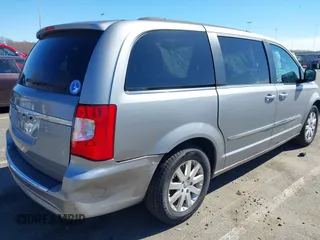 2013 Chrysler Town & Country Touring with VIN 2C4RC1BG9DR777819, listed as a IAAI auction lot 41824692 with 138,702 mi miles. Bid and sale history available at carsss.com. Image 6.
