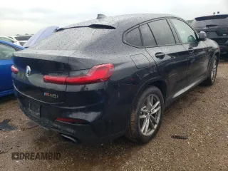 2021 BMW X4 M40i with VIN 5UX2V5C00M9H95699, listed as a Copart auction lot 63564433 with 33,500 mi miles and Salvage title. Bid and sale history available at DreamBid. Image 3.