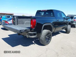 2021 GMC Sierra 1500 AT4 with VIN 3GTP9EED5MG206008, listed as a IAAI auction lot 41665423 with 61,685 mi miles. Bid and sale history available at carsss.com. Image 4.