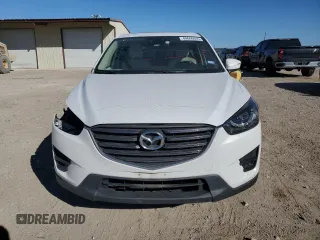 2016 Mazda CX-5 Grand Touring with VIN JM3KE2DY4G0704001, listed as a Copart auction lot 49666445 with 149,000 mi miles and Salvage Title. Bid and sale history available at carsss.com. Image 5.