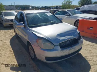 2008 Hyundai Accent GLS with VIN KMHCN46CX8U214890, listed as a IAAI auction lot 41843006 with 179,550 mi miles. Bid and sale history available at carsss.com. Image 1.
